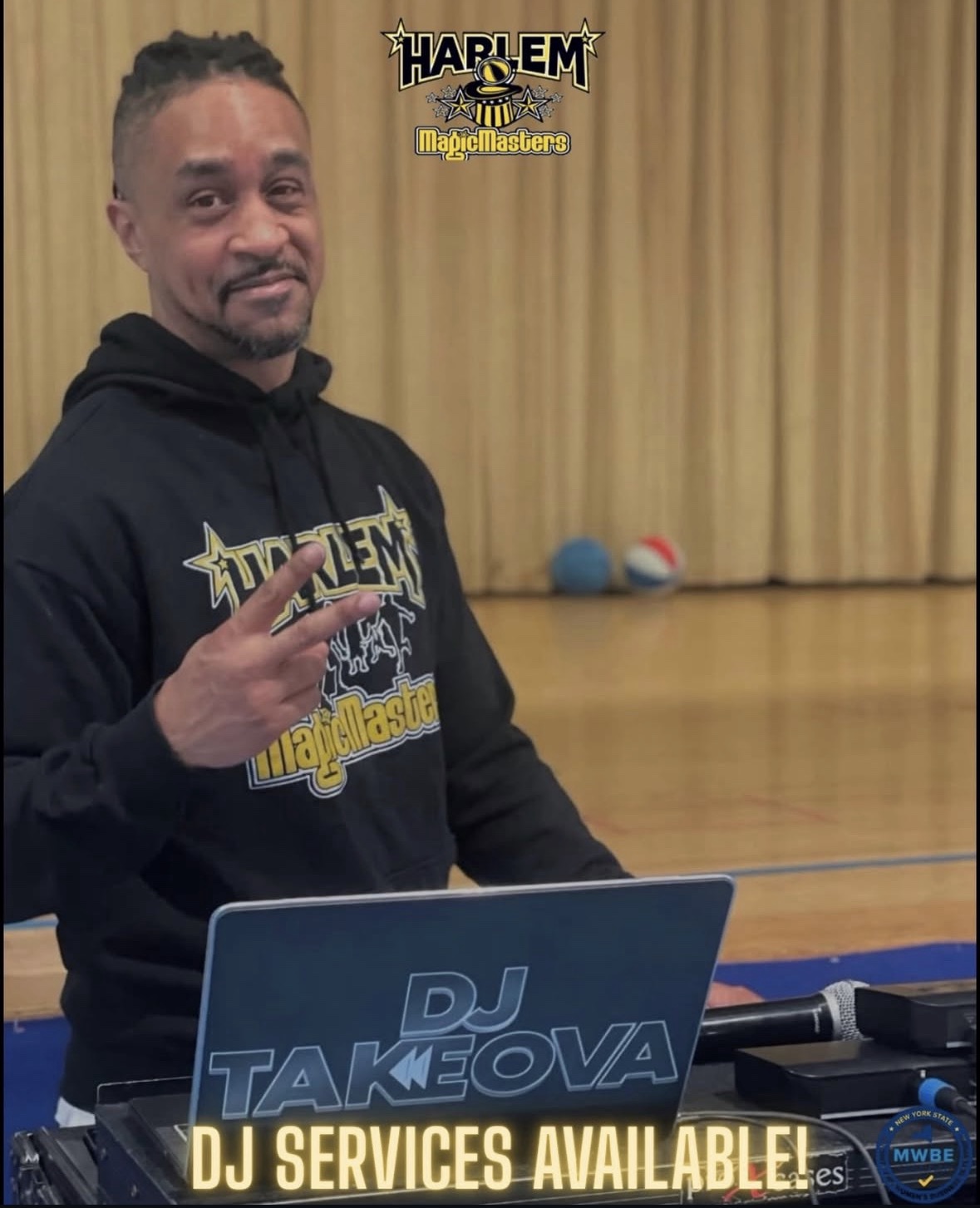 DJ Takeova at his decks in a Harlem MagicMasters hoodie on a gym floor