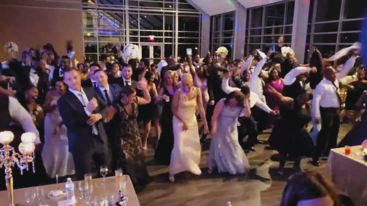 A packed wedding dance floor